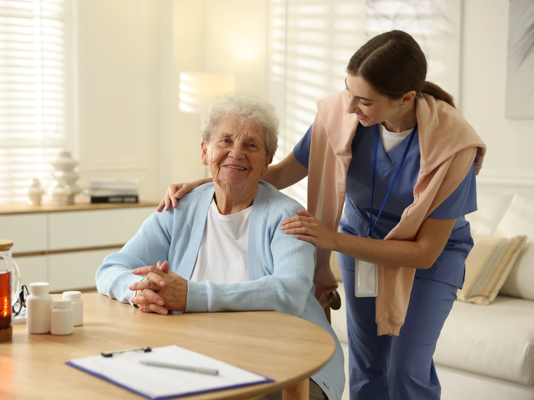 A certified home health aide assisting a senior with personalized daily care and support at home in Alexandria City, VA.