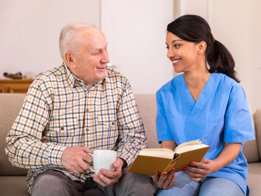 A medical social worker discussing personalized care plans and healthcare resources with a senior in Alexandria City, VA.